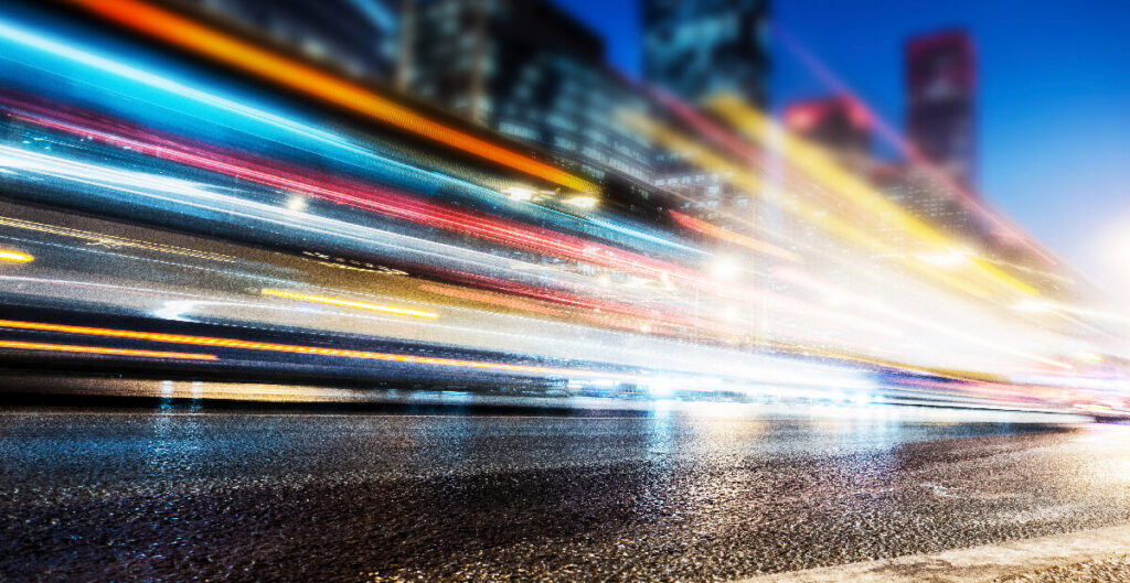 Traffic lights trailing in the city at night