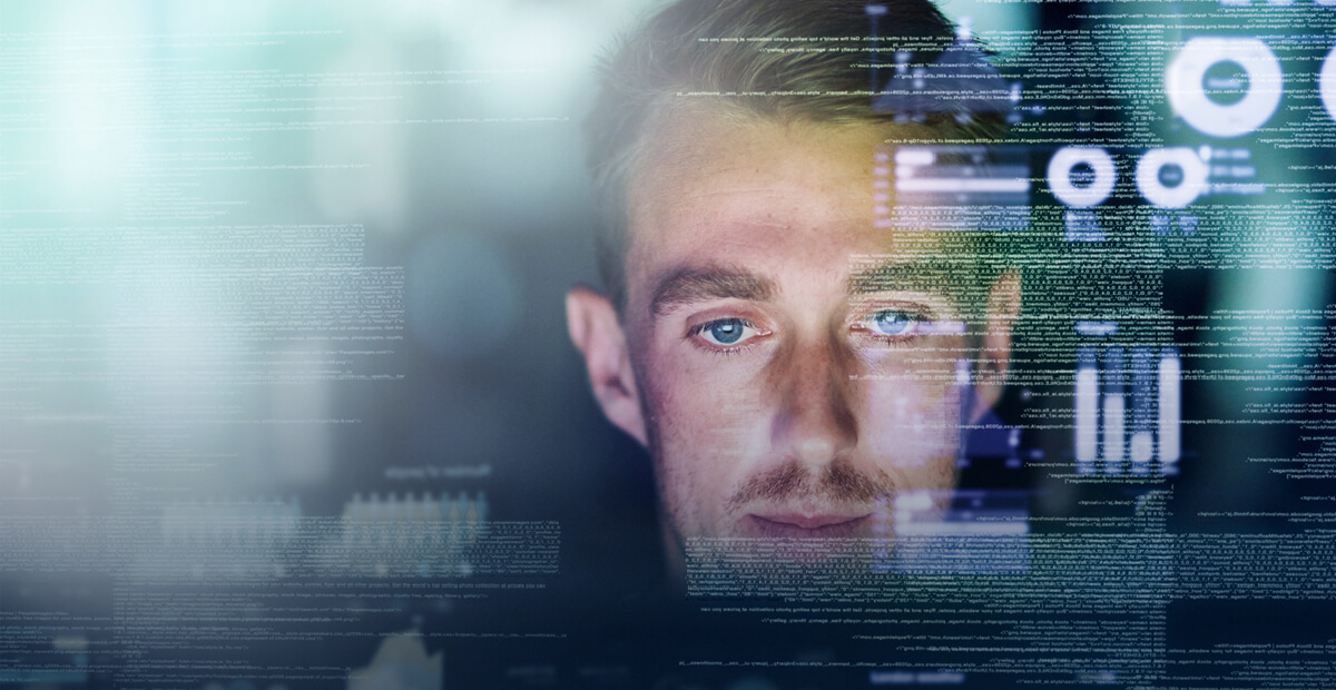 The face of a man with abstract bits of code superimposing him