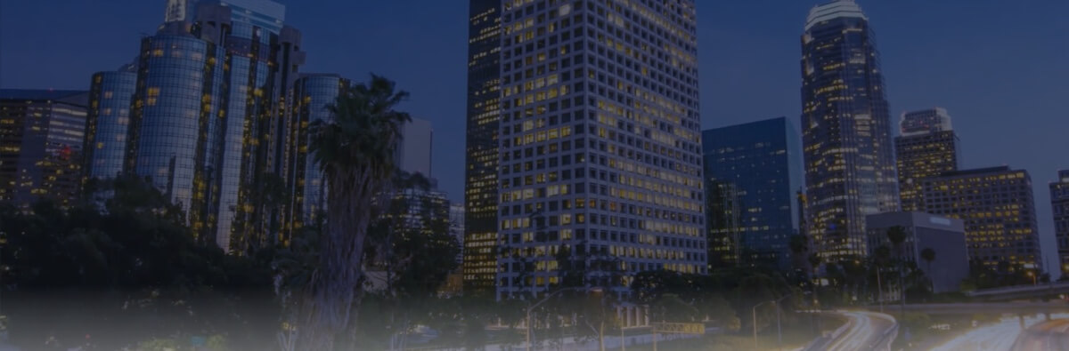 Dark image of city buildings at night