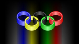 coloured 3D olympic rings on a black background